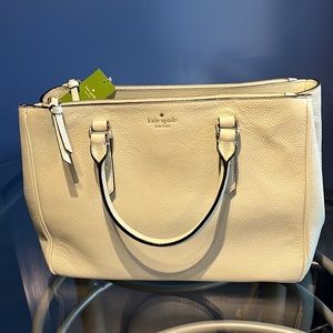 Brand new with tags Kate Spade handbag.